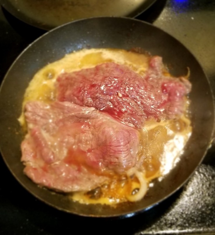 Frying carne asada