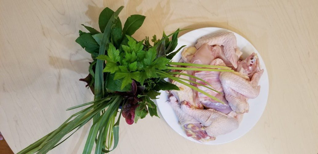 prepped chicken and herbs